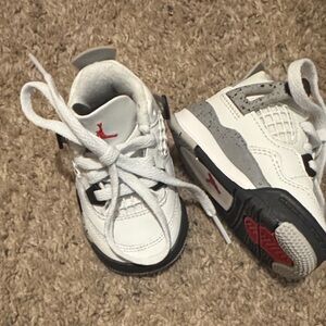 Jordan Kids White, Gray and Black Sneakers with Red Accents